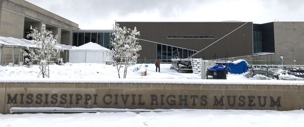 PHOTO: Snow blankets the plaza of the Mississippi Civil Rights Museum in Jackson, Miss., as workers prepare the grounds for opening day ceremonies, Dec. 8, 2017.