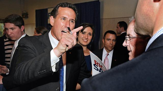 PHOTO: Republican presidential candidate Rick Santorum confronts New York Times reporter Jeff Zeleny, March 25, 2012, in Franksville, Wisc.