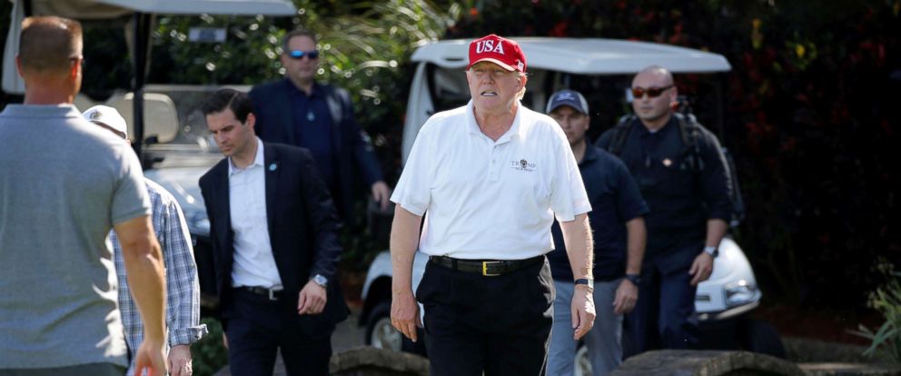 PHOTO: President Donald Trump arrives to play host to members of the U.S. Coast Guard he invited to play golf in West Palm Beach, Florida, Dec. 29, 2017.