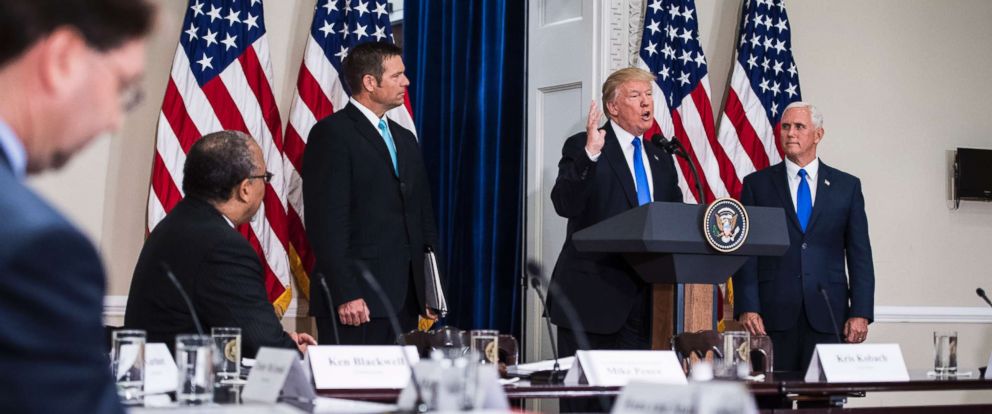 PHOTO: President Donald Trump, accompanied by Vice President Mike Pence and Kansas Secretary of State Kris Kobach, speaks at the first meeting of the Presidential Advisory Commission on Election Integrity in Washington, July 19, 2017.