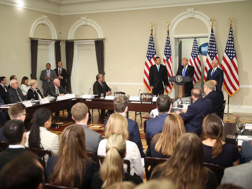 PHOTO: President Donald Trump, with Kansas Secretary of State Kris Kobach and Vice President Mike Pence, speaks at a meeting of the Presidential Advisory Commission on Election Integrity, July 19, 2017, in Washington.