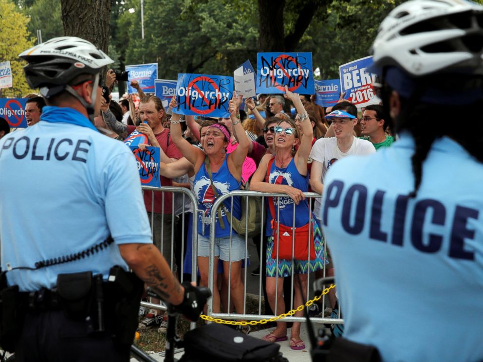 PHOTO: Bernie Sanders supporters yell across a police line during a protest at the Democratic National Convention in Philadelphia, July 25, 2016. 