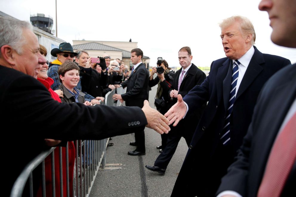 PHOTO: President Donald Trump greets supporters as he arrives aboard Air Force One en route to address a Republican congressional retreat, at Greenbrier Valley Airport in Lewisburg, West Va., U.S., Feb. 1, 2018.