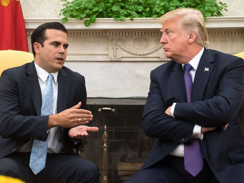 PHOTO: President Donald Trump listens as Governor Ricardo Rossello of Puerto Rico speaks during a meeting in the Oval Office at the White House on Oct. 19, 2017 in Washington, D.C.