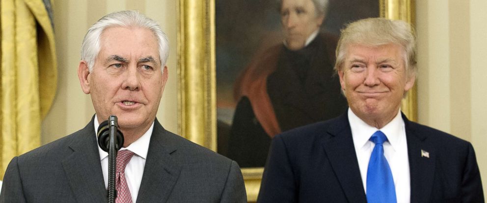 PHOTO: Rex Tillerson speaks as Donald Trump listens in the Oval Office of the White House in Washington, Feb. 1, 2017.