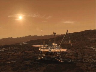 A graphic shows the Phoenix Mars Lander on the surface of Mars.