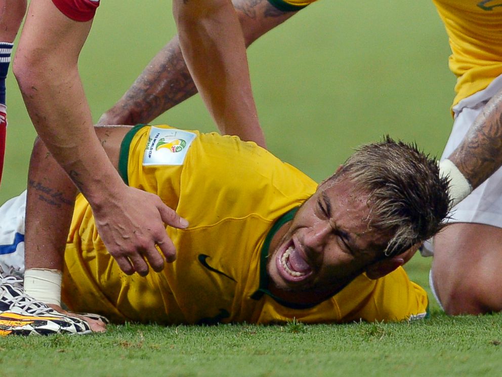 PHOTO: Brazils Neymar screams out after being fouled during the World Cup quarterfinal soccer match between Brazil and Colombia at the Arena Castelao in Fortaleza, Brazil, July 4, 2014.