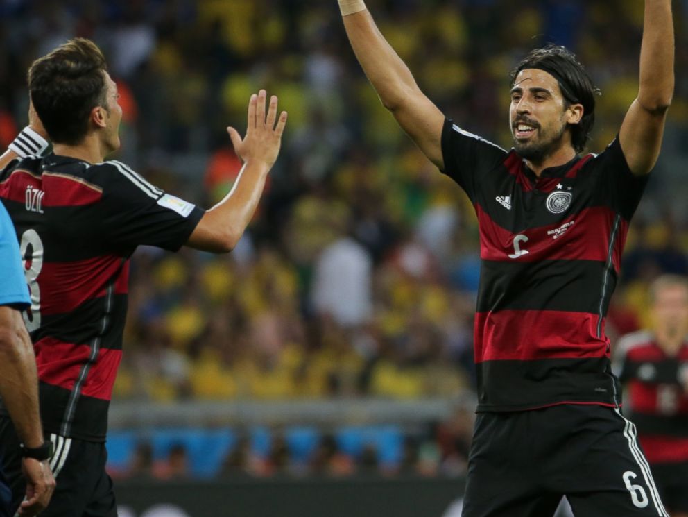 PHOTO: Germanys Sami Khedira, right, celebrates after scoring his goal during the World Cup semifinal soccer match between Brazil and Germany in Belo Horizonte, Brazil on July 8, 2014.
