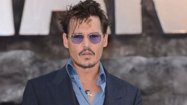 PHOTO: Johnny Depp attends the UK Premiere of The Lone Ranger at Odeon Leicester Square, July 21, 2013 in London.
