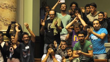 PHOTO: People celebrate after the Uruguayan senate approved a law legalizing marijuana in the Legislative Palace in Montevideo, Dec. 10, 2013.