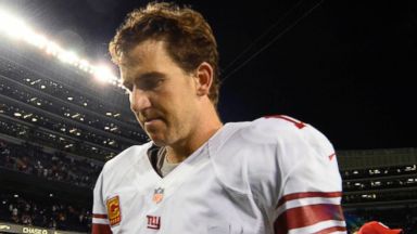 PHOTO: New York Giants quarterback Eli Manning walks off the field after a game against the Chicago Bears at Soldier Field in Chicago.