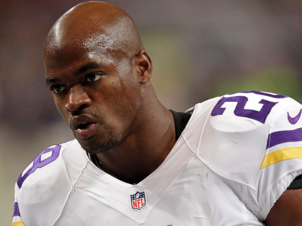 PHOTO: Minnesota Vikings running back Adrian Peterson warms up for an NFL football game against the St. Louis Rams in St. Louis, in this Sept. 7, 2014 file photo.