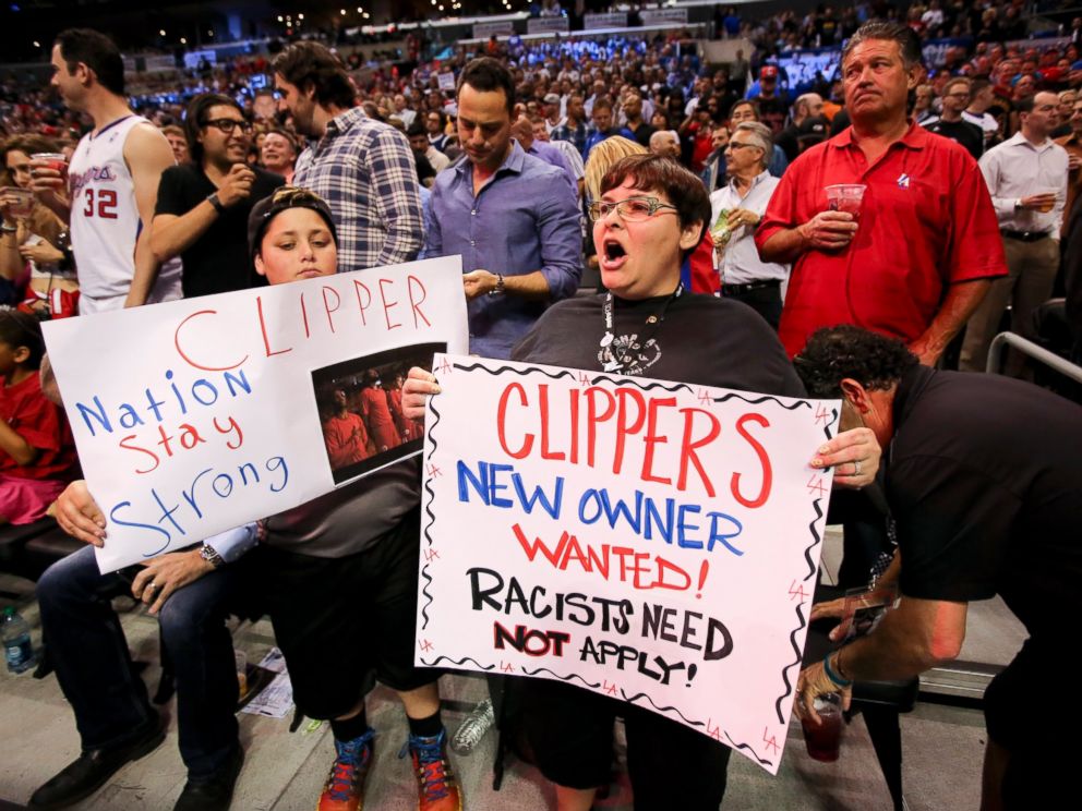 PHOTO: Fans hold up signs in support of the Los Angeles Clippers before Game 5 of an opening-round NBA basketball playoff series between the Clippers and the Golden State Warriors, Tuesday, April 29, 2014, in Los Angeles.