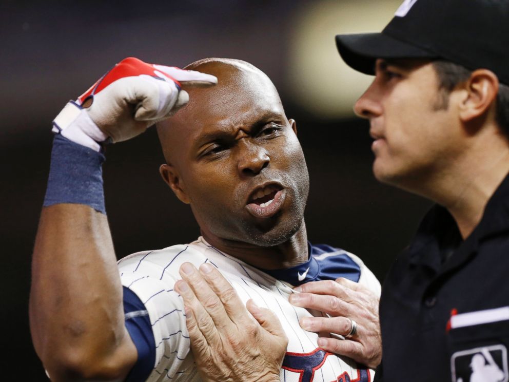 PHOTO: Umpire Jeff Kellogg restrains Minnesota Twins? Torii Hunter, left, who argues a call third strike after he was ejected by plate umpire Mark Ripperger during the eighth inning of a baseball game, June 10, 2015, in Minneapolis.