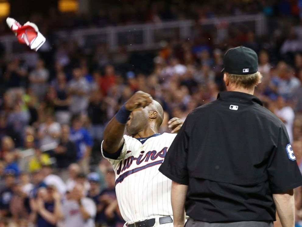 PHOTO: Minnesota Twins player Torii Hunter tosses his batting glove after he was ejected during the eighth inning of a baseball game against the Kansas City Royals, Wednesday, June 10, 2015, in Minneapolis.