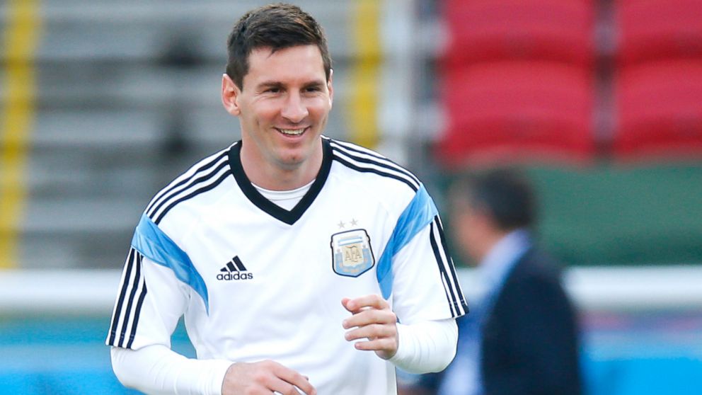 PHOTO: Argentinas Lionel Messi warms up during a training session at the Beira-Rio Stadium in Porto Alegre, Brazil, June 24, 2014.