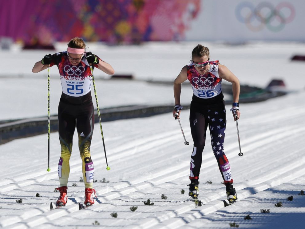 PHOTO: Germanys Nicole Fessel, left, and United States Sadie Bjornsen ski on the finish straight during the womens 10K classical-style cross-country race at the 2014 Winter Olympics, Feb. 13, 2014, in Krasnaya Polyana, Russia
