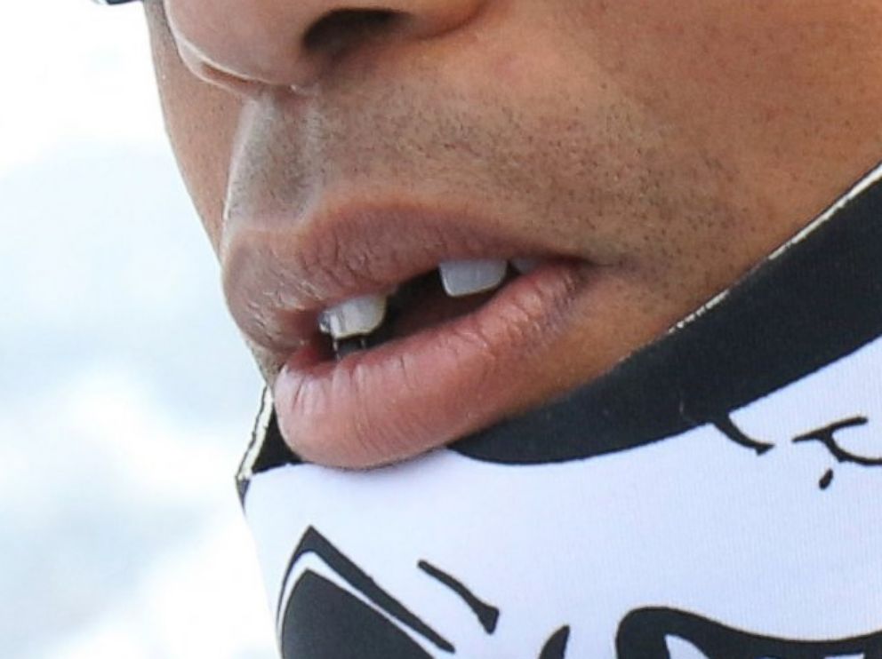 PHOTO: Tiger Woods walks in the finish area of the womens World Cup super-G