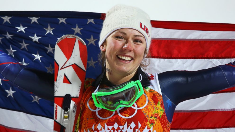 PHOTO: Gold medalist Mikaela Shiffrin of the U.S. celebrates during the flower ceremony for the Womens Slalom during day 14 of the Sochi 2014 Winter Olympics at Rosa Khutor Alpine Center, Feb. 21, 2014 in Sochi, Russia.