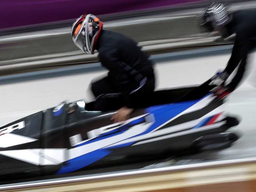 PHOTO: Members of the United States bobsleigh team practice ahead of the Sochi 2014 Winter Olympics at the Sanki Sliding Center, Feb. 6, 2014, in Sochi, Russia.