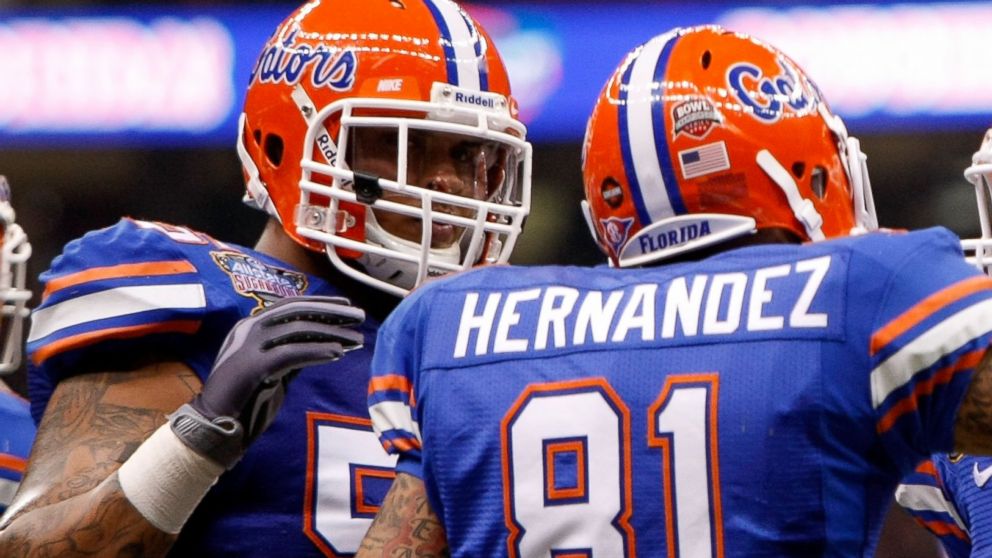 PHOTO: Aaron Hernandez #81 of the Florida Gators celebrates with his teammate Mike Pouncey #55 after scoring a touchdown in the first quarter against the Cincinnati Bearcats at the Louisana Superdome, Jan. 1, 2010, in New Orleans.
