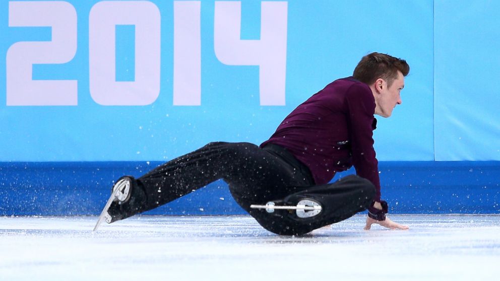 PHOTO: Jeremy Abbott of the United States falls while competing