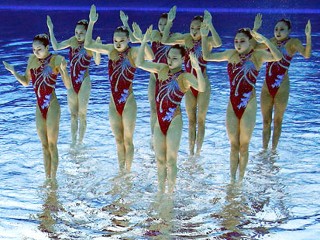 Photoshop Magic: Synchronized Swimmers Stand on Water