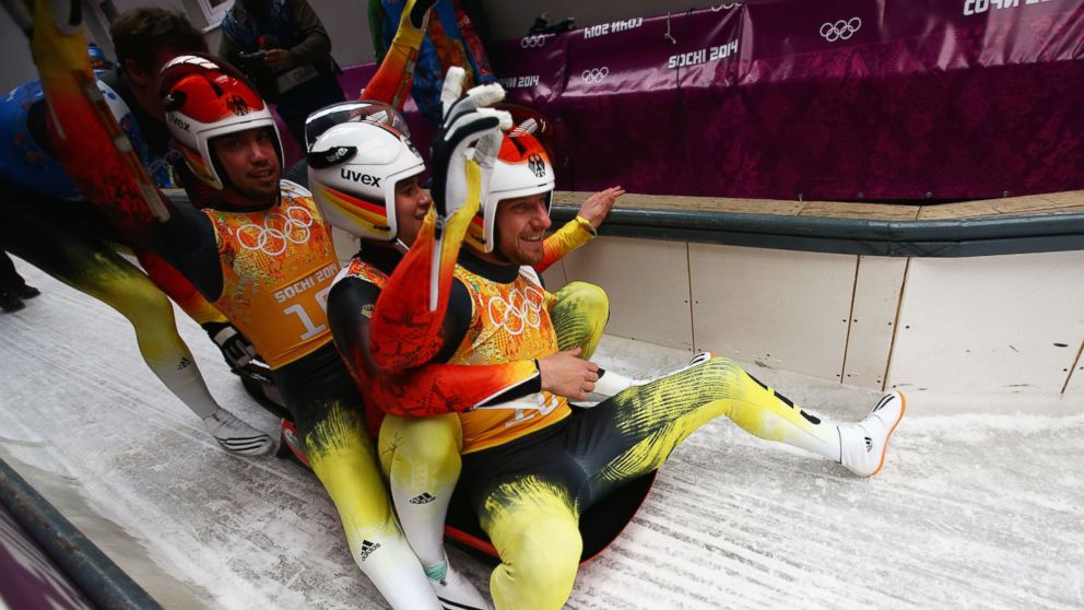 PHOTO: Tobias Wendl, Natalie Geisenberger and Tobias Arlt of Germany react after a run during the Luge Relay of the Sochi 2014 Winter Olympics at Sliding Center Sanki on Feb.13, 2014 in Sochi, Russia.