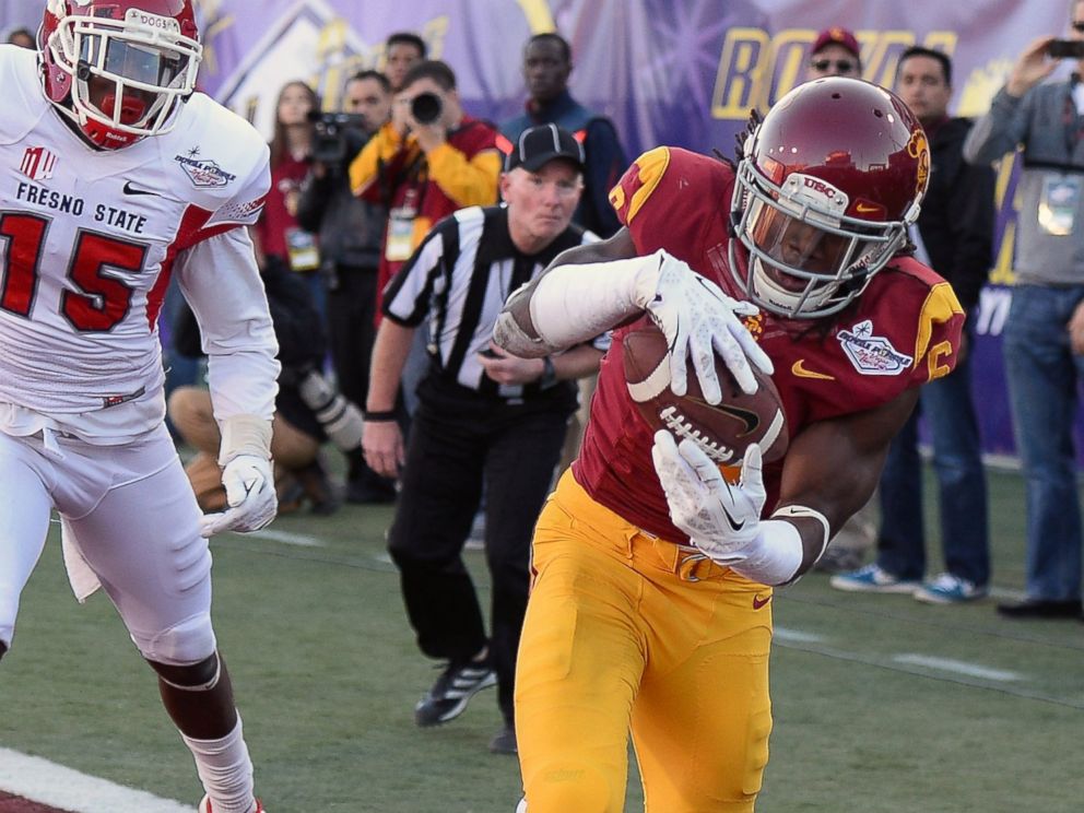 PHOTO: Josh Shaw of the USC Trojans intercepts a pass in the end zone that was intended for Davante Adams of the Fresno State Bulldogs during the Royal Purple Las Vegas Bowl on Dec. 21, 2013 in Las Vegas, Nevada.