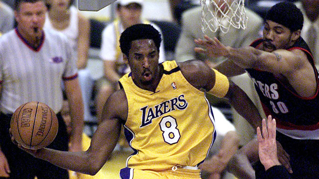 PHOTO: Kobe Bryant, of the Los Angeles Lakers passes the ball during one of the NBA Western Conference finals in Los Angeles, May 20, 2000.