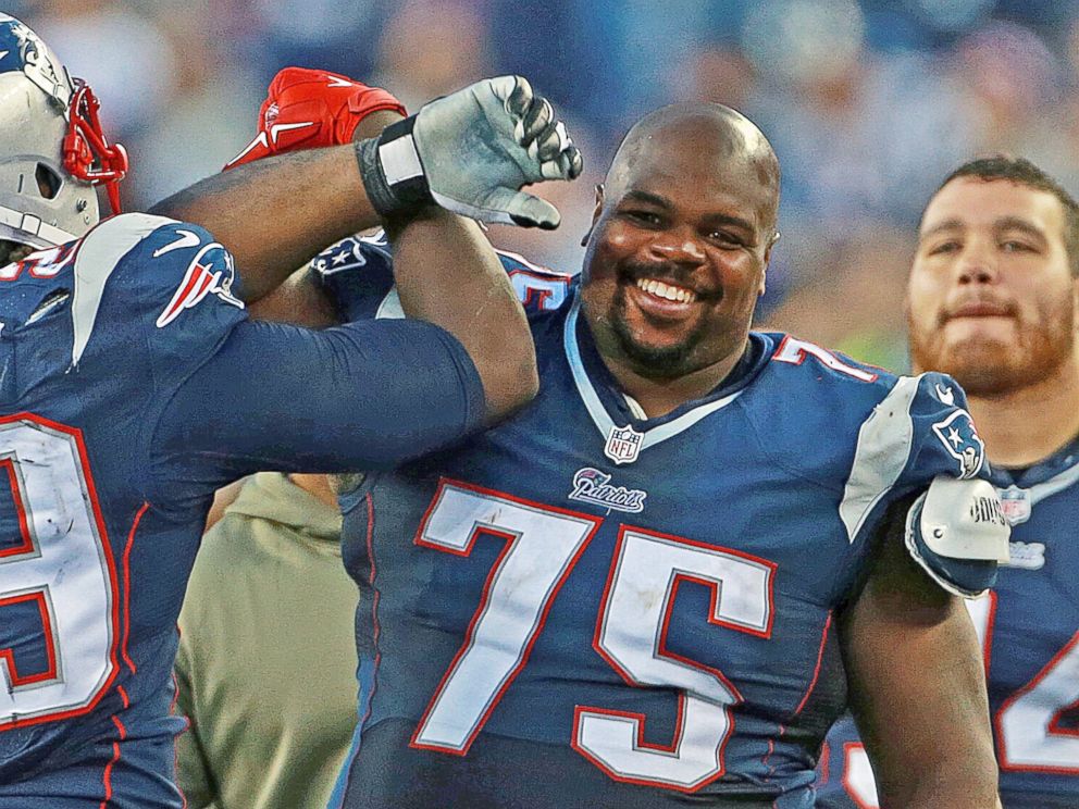 PHOTO: Vince Wilfork smiles as he leaves the game at the end of the fourth quarter after the New England Patriots played the Detroit Lions in Foxborough, Mass. on Nov. 23, 2014.