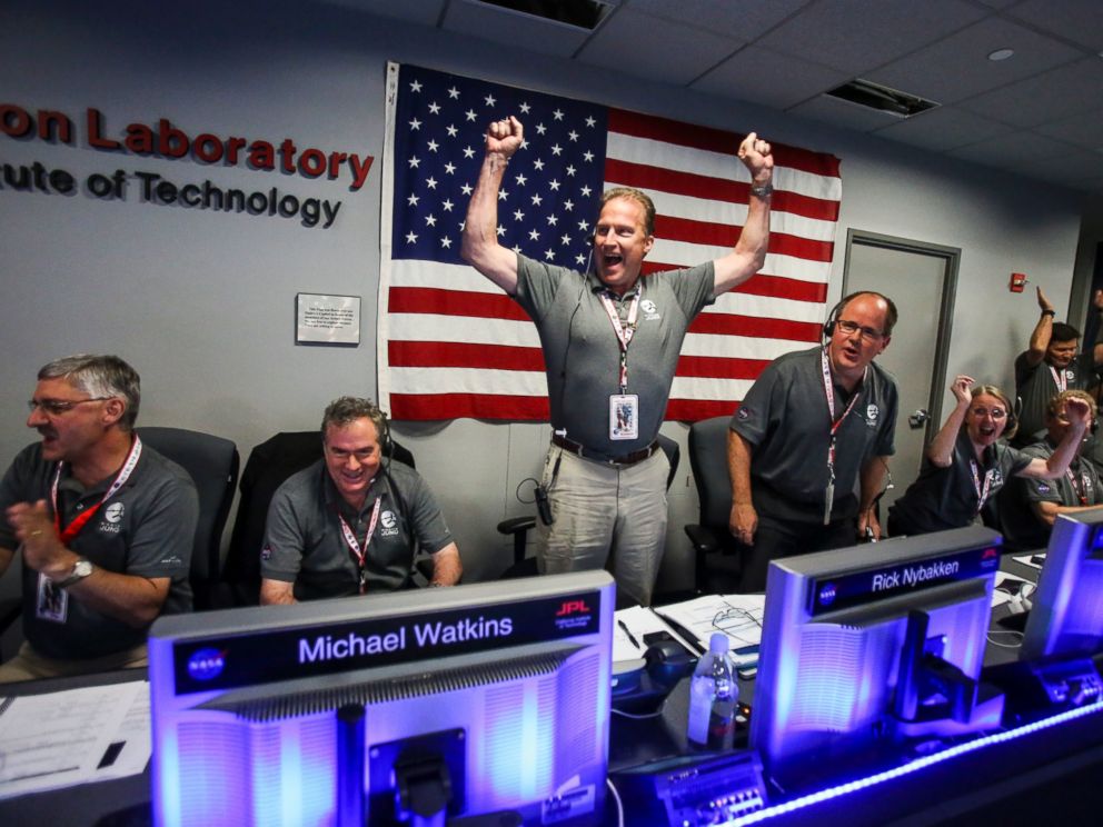 PHOTO: From left to right, Geoffrey Yoder, Michael Watkins, Rick Nybakken, Richard Cook and Jan Chodas celebrate in Mission Control at NASAs Jet Propulsion Laboratory as Juno goes into orbit around Jupiter on July 4, 2016, in Pasadena, California.
