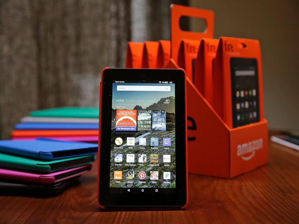 PHOTO: Amazons new $50 Fire tablet is displayed next to a six-pack of them and assorted colored cases in San Francisco on Sept. 16, 2015.