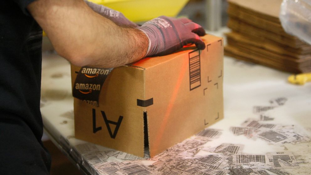 PHOTO: An employee ships packages from the Amazon San Bernardino Fulfillment Center, Oct. 29, 2013, in San Bernardino, Calif.