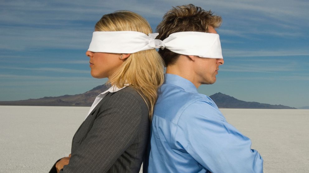 PHOTO: Blindfolded people stand back to back in this undated file photo.