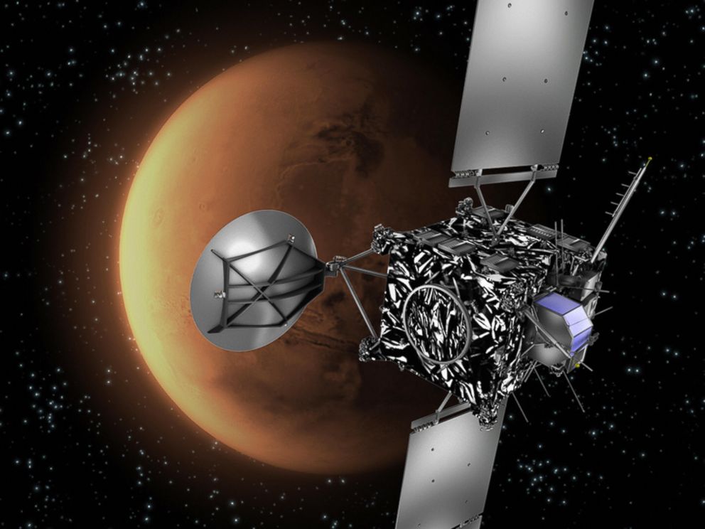 PHOTO: This image shows an artists impression of the European Space Agency (ESA) probe Rosetta with Mars in the background.
