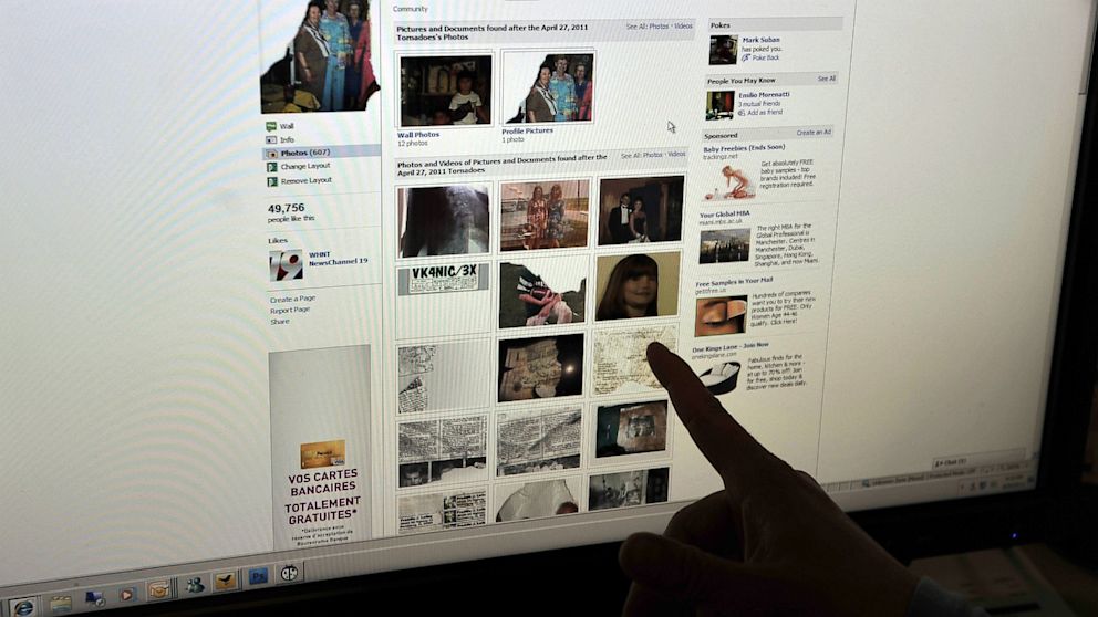 PHOTO: A woman looks at a Facebook page.
