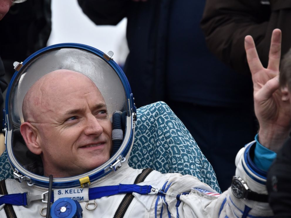 PHOTO: International Space Station (ISS) crew member Scott Kelly of the U.S. shows a victory sign after landing near the town of Dzhezkazgan, Kazakhstan, on March 2, 2016.