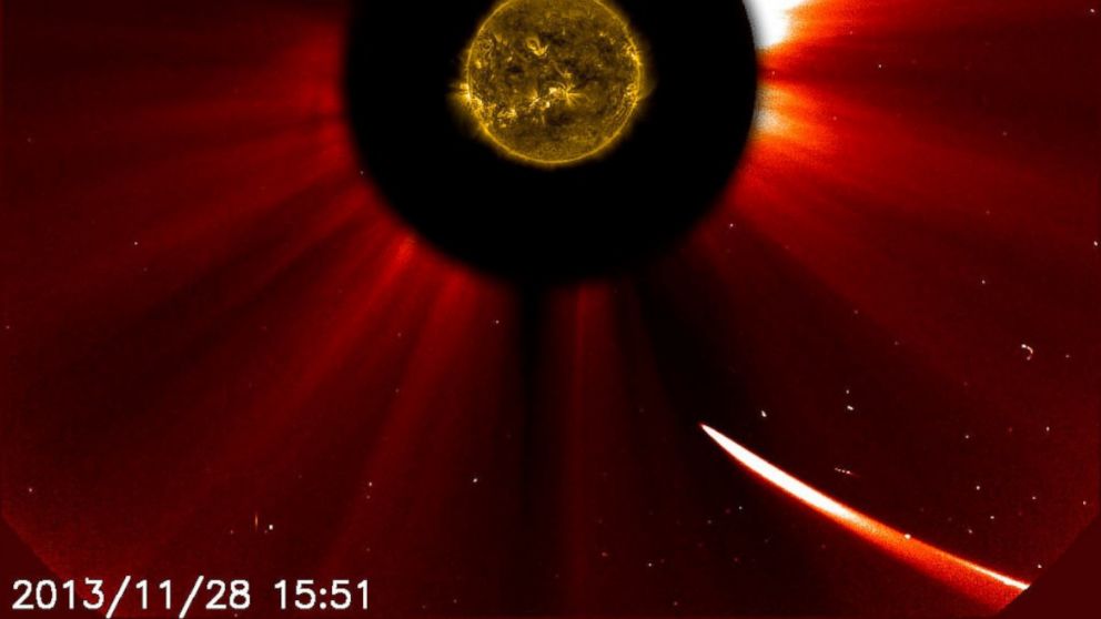 PHOTO: Comet ISON moves closer to the sun in this image composite with the sun imaged by NASAs Solar Dynamics Observatory in the center, and SOHO showing the solar atmosphere, the corona captured at 10:51 a.m. EST, Nov. 28, 2013.