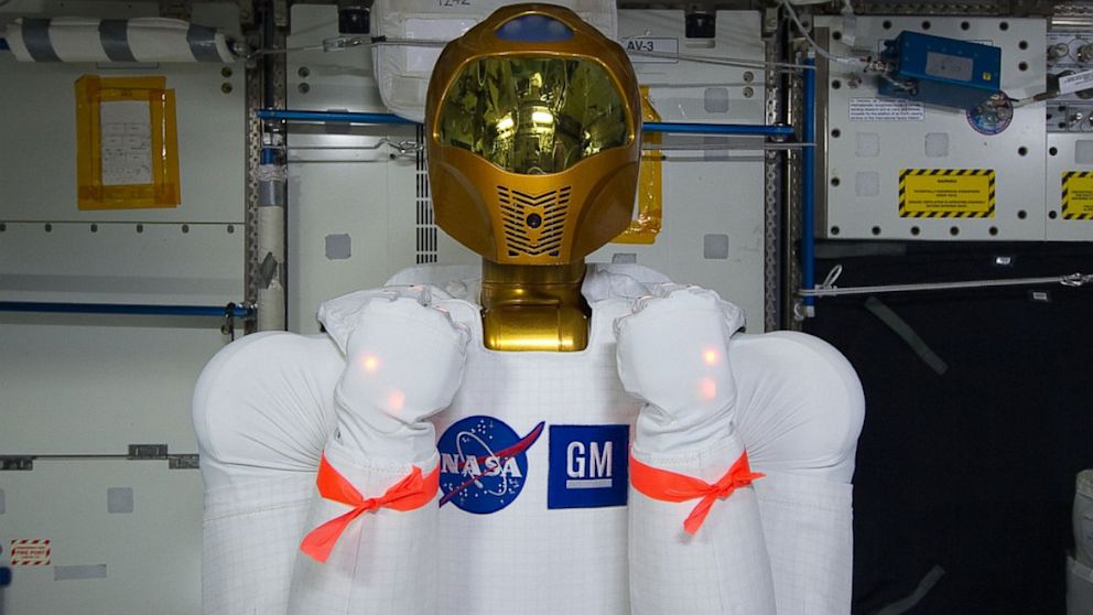 PHOTO: Robonaut is good to go after the power soak. The red ribbon is to remind the crew not to use its arms as handles.