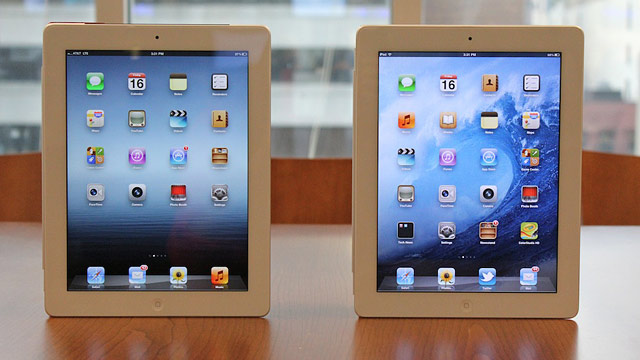 PHOTO: The new iPad and the iPad 2 stand side by side.