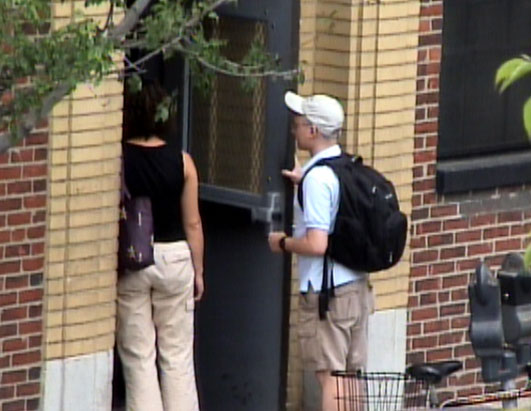 MIT Couple Enter Wtih Bag and Backpack