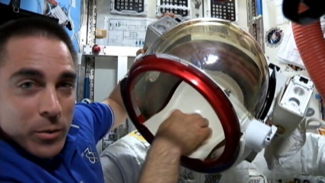 VIDEO: Astronaut Chris Cassidy shows possible sources of fluid that drained into Luca Parmitanos helmet.