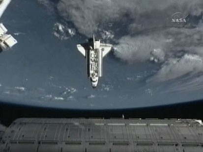 VIDEO: Endeavour docks at international space station.