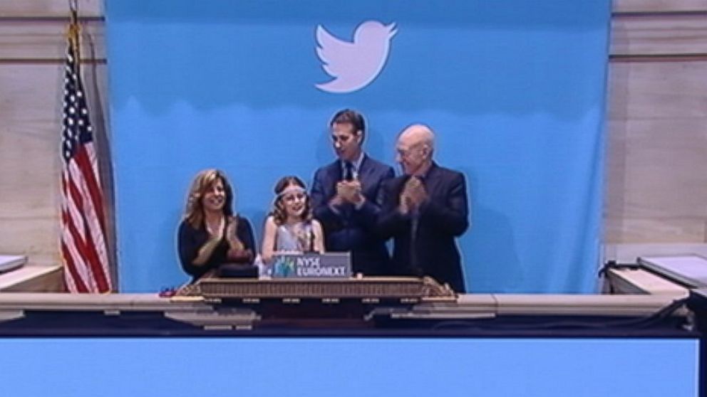 PHOTO: Patrick Stewart, right, 9-year-old lemonade stand owner Vivienne Harr and a representative from the Boston PD were on hand to ring the opening bell on the New York Stock Exchange, Nov. 7, 2013.