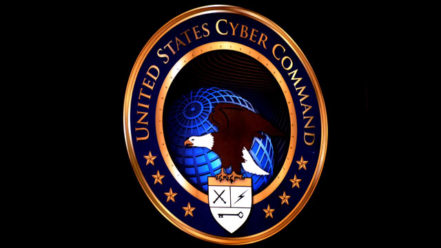 PHOTO: The new U.S. Cyber Command logo is displayed during the activation ceremony of USCYBERCOM at Ft. Meade, MD.