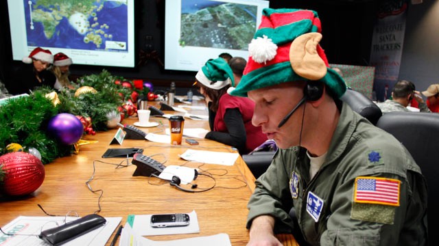 norad santa games. norad santa games 2010. An Air Force Lt. takes a phone call from a