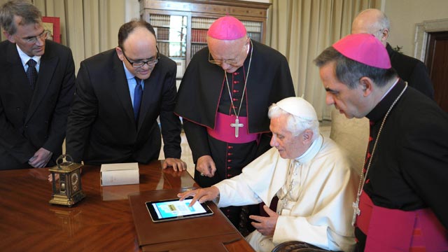 PHOTO: Pope Benedict XVI touches an iPad to send a tweet for the launch of the Vatican news information portal "www.news.va", at the Vatican, June 28, 2011.