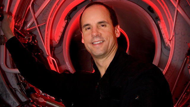 PHOTO: In this Dec. 12, 2005 file photo, Steve Appleton, CEO and chairman of Micron Technology Inc., looks out through the engine compartment of his stunt jet airplane inside the hanger where he keeps several different types of aircraft in Boise, Idaho.