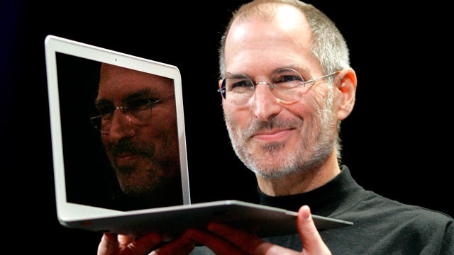 PHOTO: In this Jan. 15, 2008, file photo, Apple CEO Steve Jobs holds up the new MacBook Air after giving the keynote address at the Apple MacWorld Conference in San Francisco.